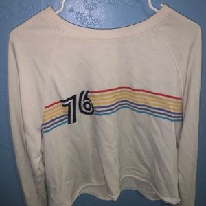A white crop top sweater